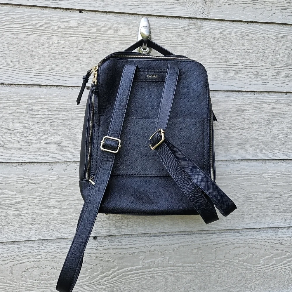 Calpak Kaya black faux leather laptop travel backpack